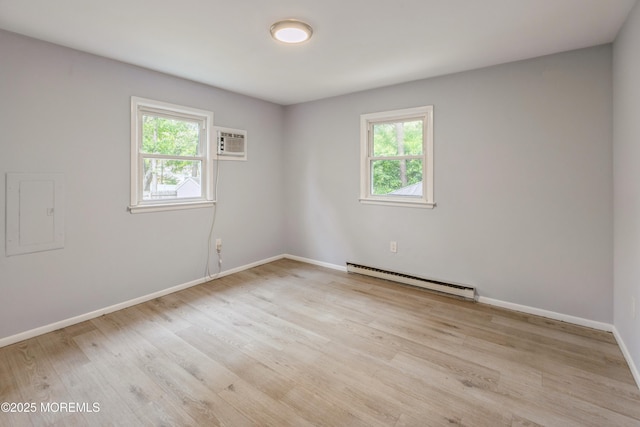 442 Bay Way, Lanoka Harbor, NJ 08734 - unfurnished room featuring baseboard heating, healthy amount of natural light, light wood-style flooring, and baseboards