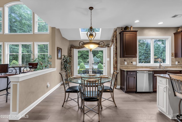 209 Shepard Way, Manalapan, NJ 07726 - dining space featuring healthy amount of natural light, light wood-style floors, and recessed lighting