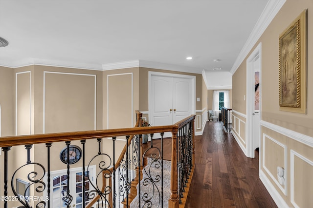 209 Shepard Way, Manalapan, NJ 07726 - corridor with a decorative wall, an upstairs landing, dark wood-style floors, ornamental molding, and a wainscoted wall