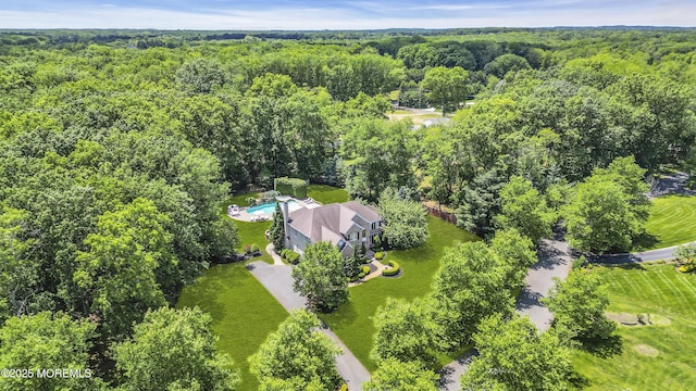 209 Shepard Way, Manalapan, NJ 07726 - aerial view of a heavily wooded area and a pool area
