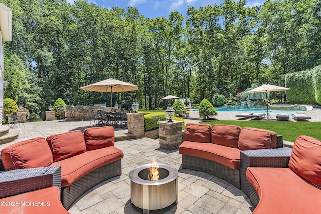 209 Shepard Way, Manalapan, NJ 07726 - view of patio with an outdoor living space with a fire pit and an outdoor pool