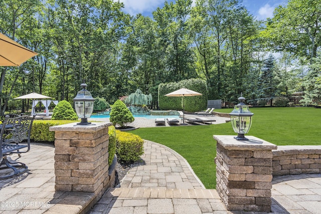 209 Shepard Way, Manalapan, NJ 07726 - view of patio / terrace with an outdoor pool and view of scattered trees