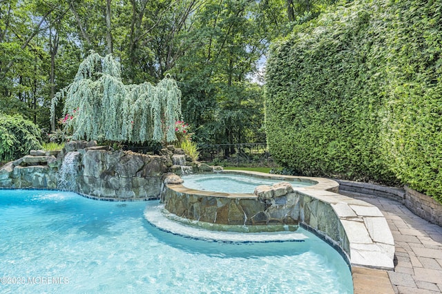 209 Shepard Way, Manalapan, NJ 07726 - view of swimming pool with a pool with connected hot tub
