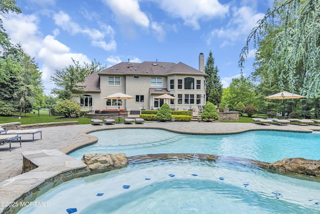 209 Shepard Way, Manalapan, NJ 07726 - view of pool with a pool with connected hot tub and a patio