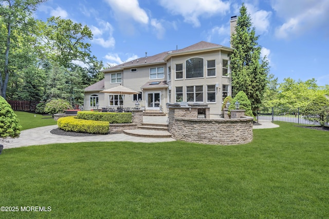 209 Shepard Way, Manalapan, NJ 07726 - back of house featuring a chimney and a patio