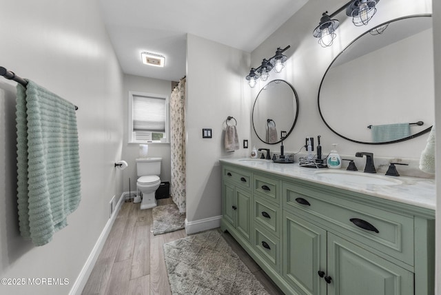 6 Overlook Dr, Jackson, NJ 08527 - bathroom featuring double vanity, baseboards, toilet, and wood finished floors