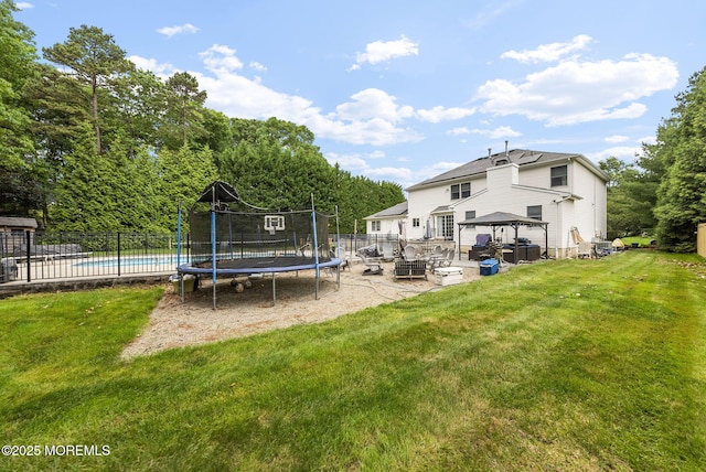 6 Overlook Dr, Jackson, NJ 08527 - rear view of house featuring a gazebo, a patio area, and a trampoline