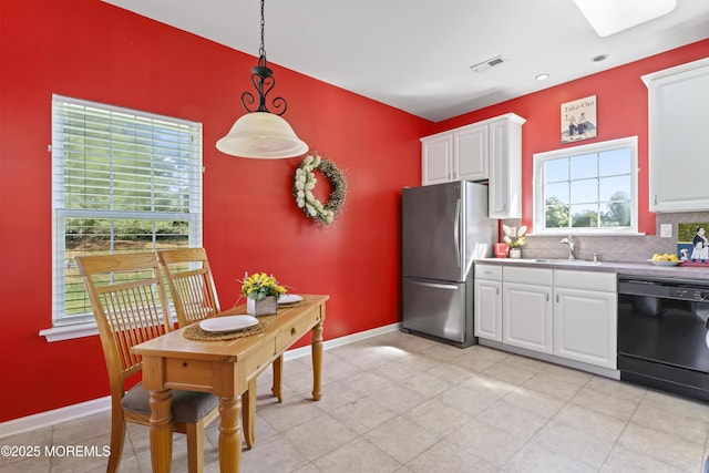 8 Chaminox Ct, Manchester, NJ 08759 - kitchen featuring dishwasher, freestanding refrigerator, white cabinetry, decorative backsplash, and recessed lighting