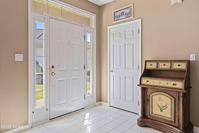 8 Chaminox Ct, Manchester, NJ 08759 - entrance foyer with healthy amount of natural light, light tile patterned flooring, and baseboards