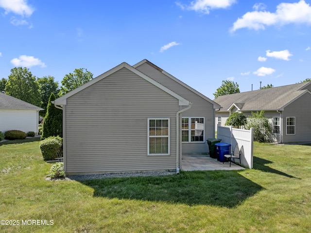 8 Chaminox Ct, Manchester, NJ 08759 - back of property featuring a patio and a yard