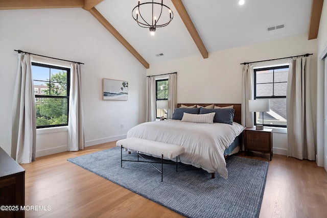405 Ludlow Ave, Spring Lake, NJ 07762 - bedroom featuring multiple windows, a chandelier, light wood-style floors, baseboards, and recessed lighting
