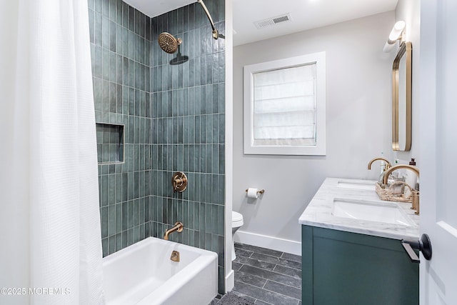 405 Ludlow Ave, Spring Lake, NJ 07762 - bathroom featuring double vanity, shower / tub combo, toilet, and baseboards