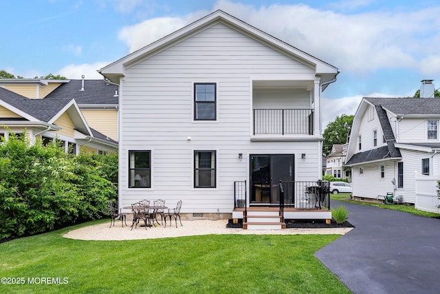 405 Ludlow Ave, Spring Lake, NJ 07762 - rear view of property featuring a balcony, a lawn, and crawl space
