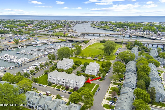 401 Captains Way, Neptune Township, NJ 07753 - aerial overview of property's location with a large body of water, numerous boat docks, and a notable bridge