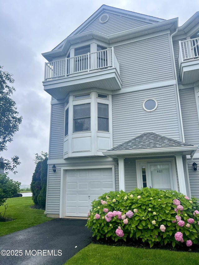 401 Captains Way, Neptune Township, NJ 07753 - view of front of house featuring a balcony and an attached garage