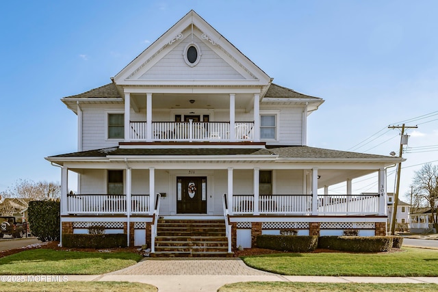 304 8th Ave, Belmar, NJ 07719 - view of front of property featuring a shingled roof, a balcony, a porch, and a front lawn
