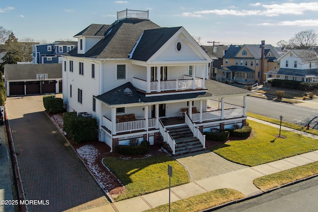 304 8th Ave, Belmar, NJ 07719 - view of front of house with covered porch, a balcony, roof with shingles, a residential view, and a front lawn