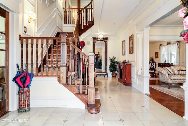 304 8th Ave, Belmar, NJ 07719 - stairs with a decorative wall, ornate columns, ornamental molding, and tile patterned flooring