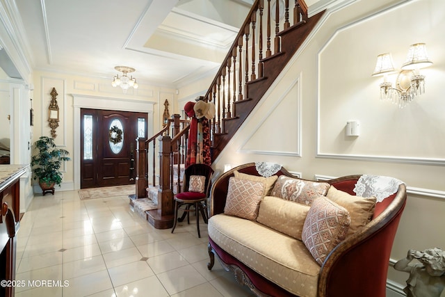 304 8th Ave, Belmar, NJ 07719 - entrance foyer with a chandelier, ornamental molding, stairs, and light tile patterned floors