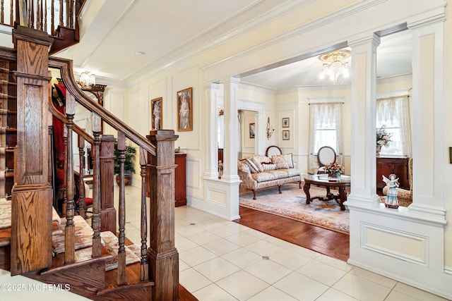 304 8th Ave, Belmar, NJ 07719 - entryway featuring a decorative wall, crown molding, stairs, tile patterned flooring, and decorative columns