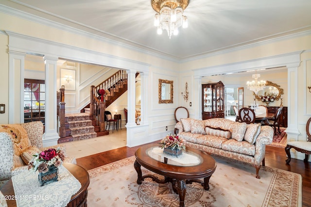 304 8th Ave, Belmar, NJ 07719 - living room with wood finished floors, healthy amount of natural light, ornate columns, crown molding, and a decorative wall