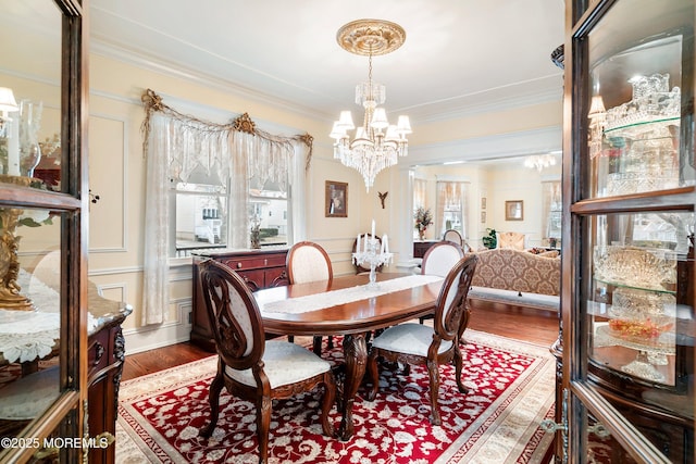 304 8th Ave, Belmar, NJ 07719 - dining area with a chandelier, wood finished floors, and ornamental molding