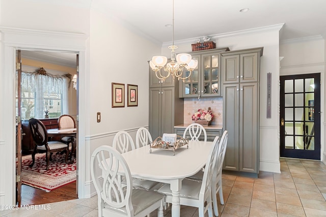 304 8th Ave, Belmar, NJ 07719 - dining area with crown molding and a chandelier