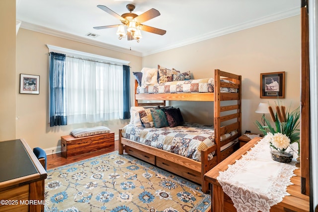 304 8th Ave, Belmar, NJ 07719 - bedroom featuring crown molding, wood finished floors, baseboards, and a ceiling fan