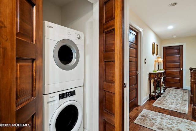 304 8th Ave, Belmar, NJ 07719 - washroom with stacked washer and clothes dryer, dark wood-type flooring, recessed lighting, and baseboards