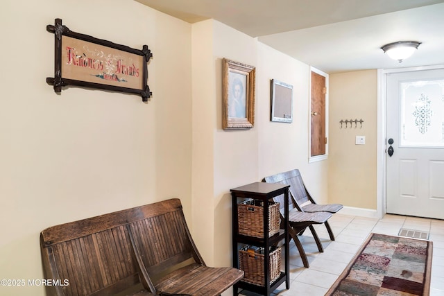 304 8th Ave, Belmar, NJ 07719 - foyer entrance featuring light tile patterned floors and baseboards