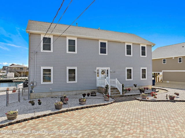 128 E Delaware Dr, Little Egg Harbor, NJ 08087 - back of property with a patio