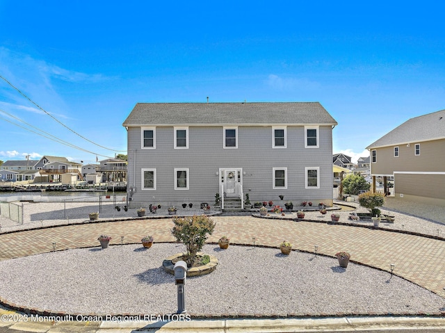 128 E Delaware Dr, Little Egg Harbor, NJ 08087 - back of house with a residential view, a patio, and entry steps