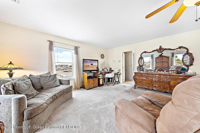 128 E Delaware Dr, Little Egg Harbor, NJ 08087 - carpeted living room with a ceiling fan