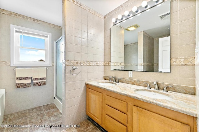 128 E Delaware Dr, Little Egg Harbor, NJ 08087 - full bath with tile walls, double vanity, and a shower stall