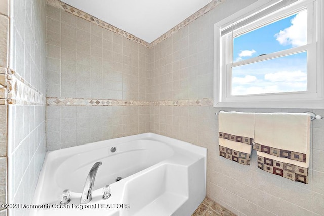 128 E Delaware Dr, Little Egg Harbor, NJ 08087 - full bathroom with tile walls and a garden tub