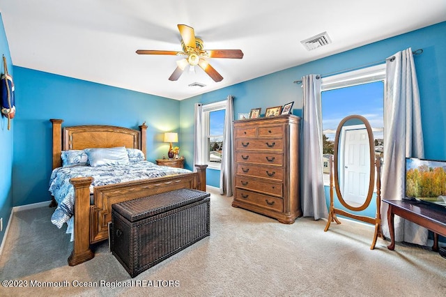 128 E Delaware Dr, Little Egg Harbor, NJ 08087 - bedroom with carpet, baseboards, and a ceiling fan