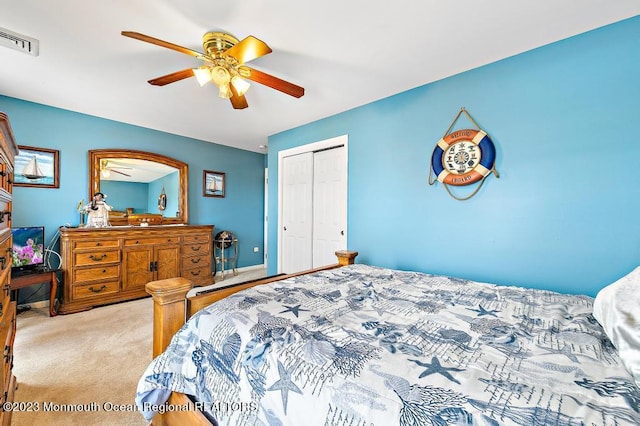 128 E Delaware Dr, Little Egg Harbor, NJ 08087 - bedroom with light colored carpet, a closet, and ceiling fan