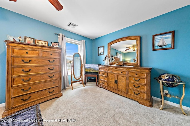 128 E Delaware Dr, Little Egg Harbor, NJ 08087 - bedroom featuring light carpet, baseboards, and a ceiling fan