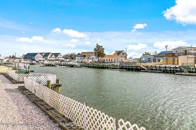 128 E Delaware Dr, Little Egg Harbor, NJ 08087 - dock area featuring a residential view and a water view