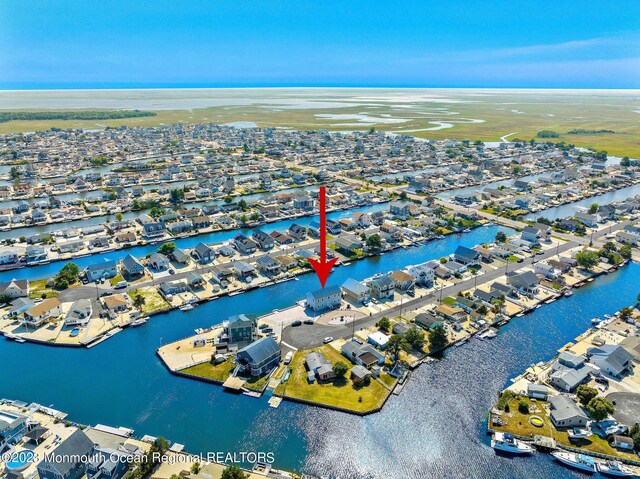 128 E Delaware Dr, Little Egg Harbor, NJ 08087 - aerial perspective of suburban area featuring a large body of water