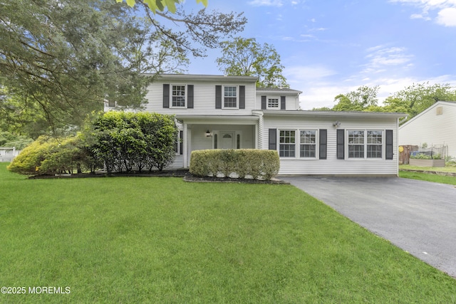 850 Paul Dr, Toms River, NJ 08753 - traditional-style house featuring asphalt driveway and a front yard