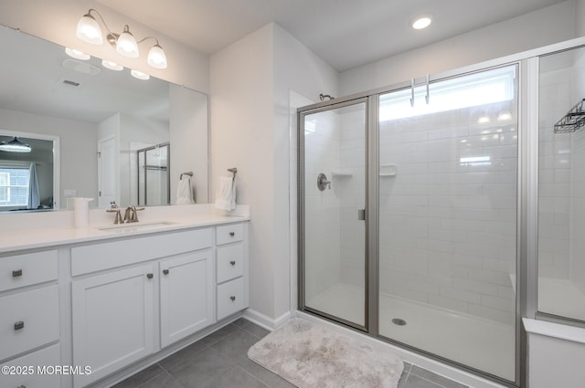 10 Osprey Ave, Manahawkin, NJ 08050 - full bathroom with a shower stall, tile patterned floors, vanity, and baseboards