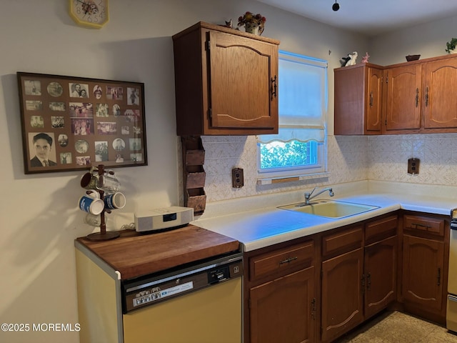 138 Hudson Pkwy Unit B, Whiting, NJ 08759 - kitchen with dishwasher, a sink, light countertops, and backsplash