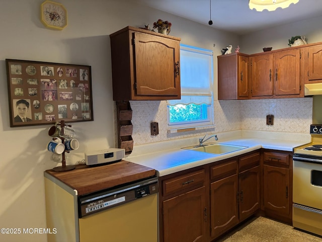 138 Hudson Pkwy Unit B, Whiting, NJ 08759 - kitchen with electric range oven, a sink, dishwasher, under cabinet range hood, and light countertops