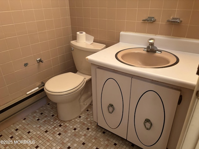 138 Hudson Pkwy Unit B, Whiting, NJ 08759 - bathroom featuring vanity, toilet, tile walls, and tile patterned flooring