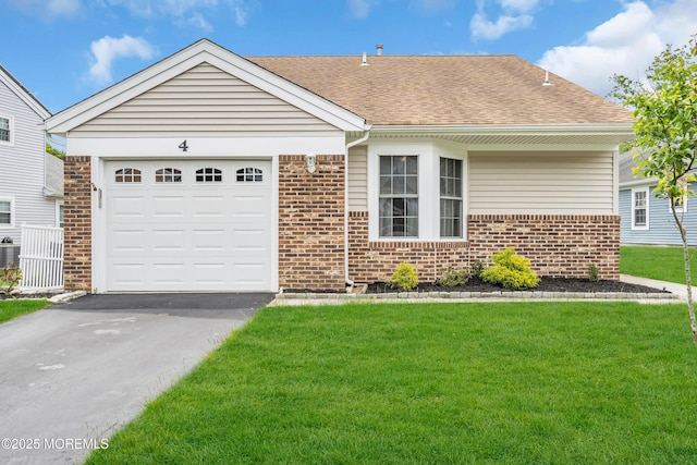 4 Beechwood Ct, Barnegat, NJ 08005 - ranch-style house with brick siding, a front lawn, a shingled roof, driveway, and a garage