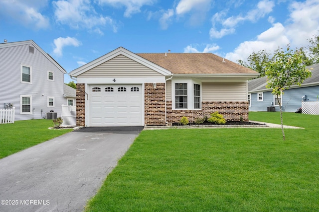 4 Beechwood Ct, Barnegat, NJ 08005 - single story home featuring brick siding, cooling unit, driveway, and a front yard