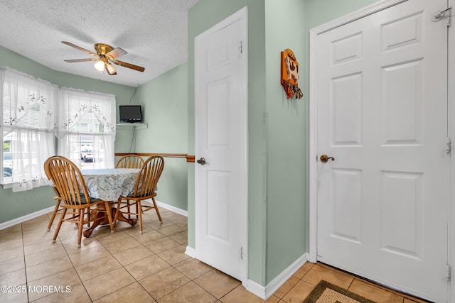 4 Beechwood Ct, Barnegat, NJ 08005 - dining space featuring ceiling fan, light tile patterned floors, baseboards, and a textured ceiling