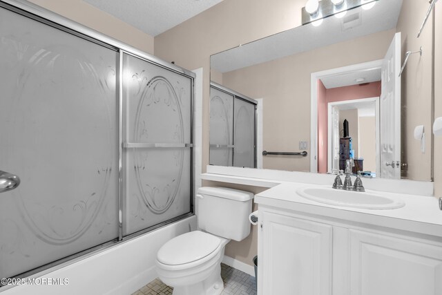 4 Beechwood Ct, Barnegat, NJ 08005 - full bathroom with vanity, toilet, bath / shower combo with glass door, and tile patterned flooring