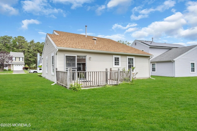 4 Beechwood Ct, Barnegat, NJ 08005 - back of property featuring a lawn and roof with shingles